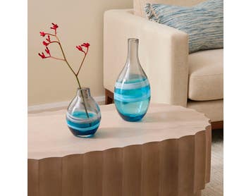 https://s3-ap-southeast-2.amazonaws.com/fusionfactory.commerceconnect.bbnt.production/pim_media/000/174/875/E-Comm_S24-25_Summer_LS_Studio-Decorator_Glass_Vases_Mountain_View-Blue-Grey_SI.jpg?1730253967