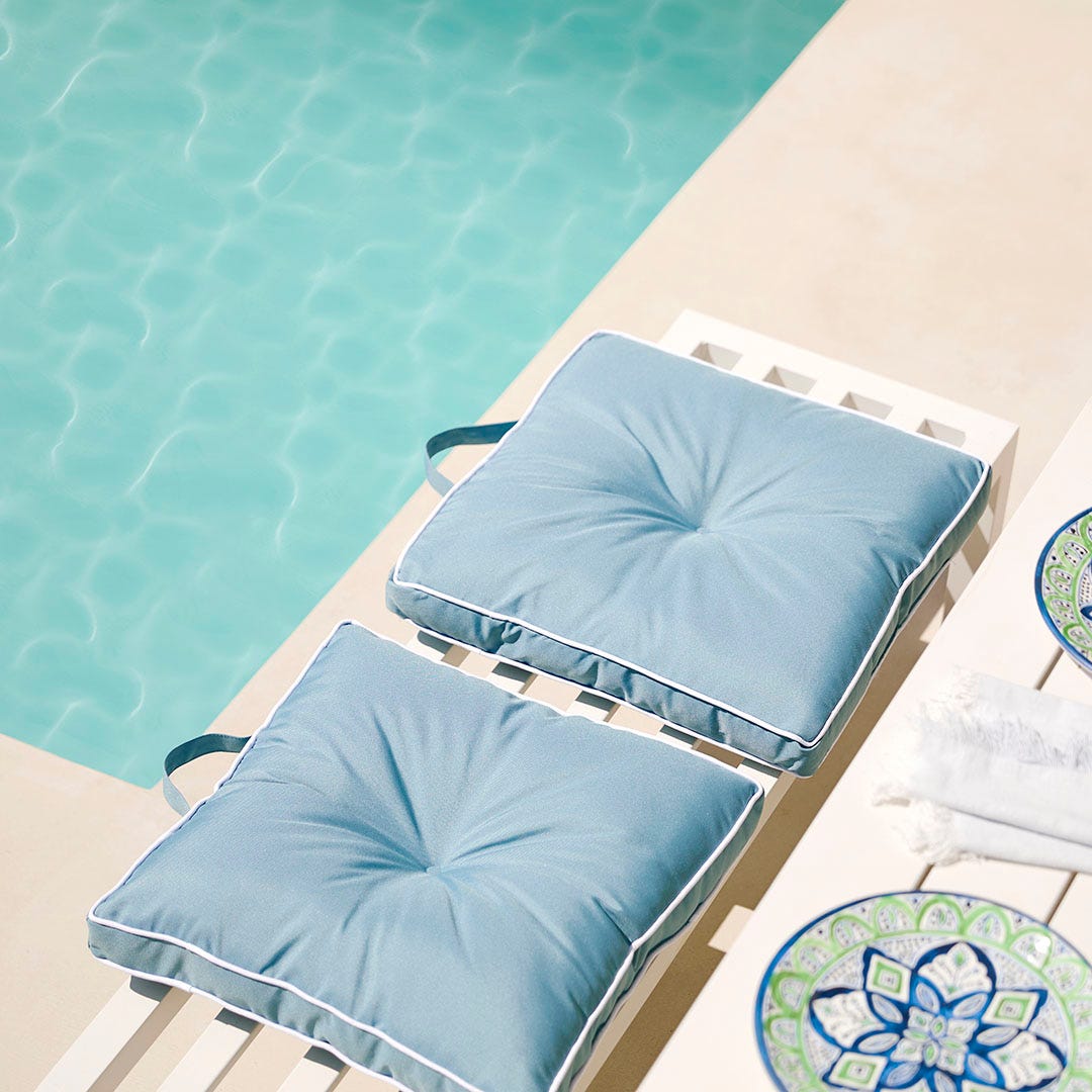 https://s3-ap-southeast-2.amazonaws.com/fusionfactory.commerceconnect.bbnt.production/pim_media/000/173/902/M_F_S24-25_Summer_LS_Sorrento_Chair_Pads_Outdoor_Panama_Smoke_Blue.jpg?1729726362