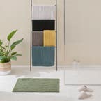 https://s3-ap-southeast-2.amazonaws.com/fusionfactory.commerceconnect.bbnt.production/pim_media/000/174/429/M_F_S24-25_Summer_LS_Studio_Bathmats-Devon_BM_Khaki_SI.jpg?1730098069