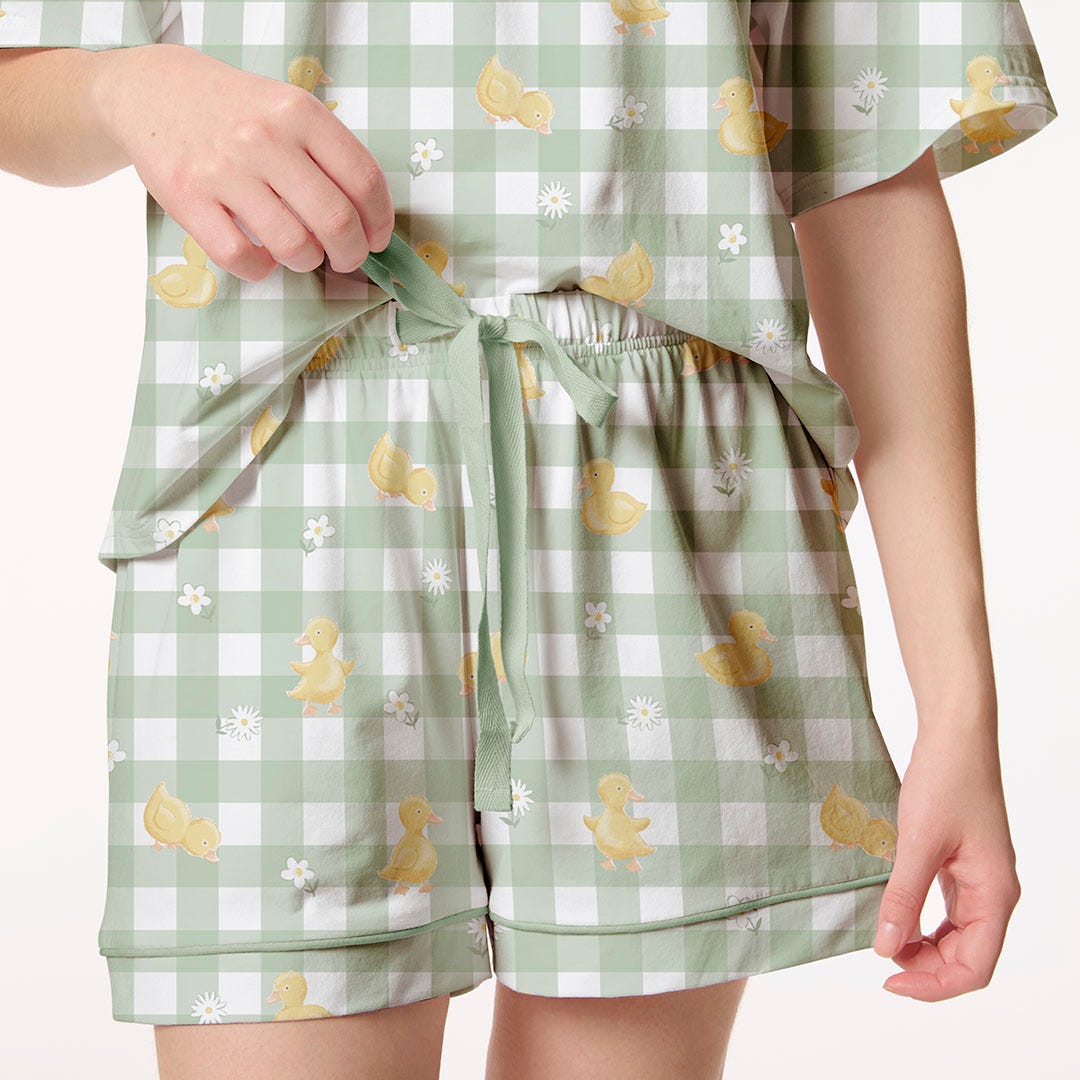 https://s3-ap-southeast-2.amazonaws.com/fusionfactory.commerceconnect.bbnt.production/pim_media/000/198/863/M_F_S25_Jersey_Pyjamas_Adult_Short-PJ-Set_Front_Detail_DUCKLINGS_SI.jpg?1754359085