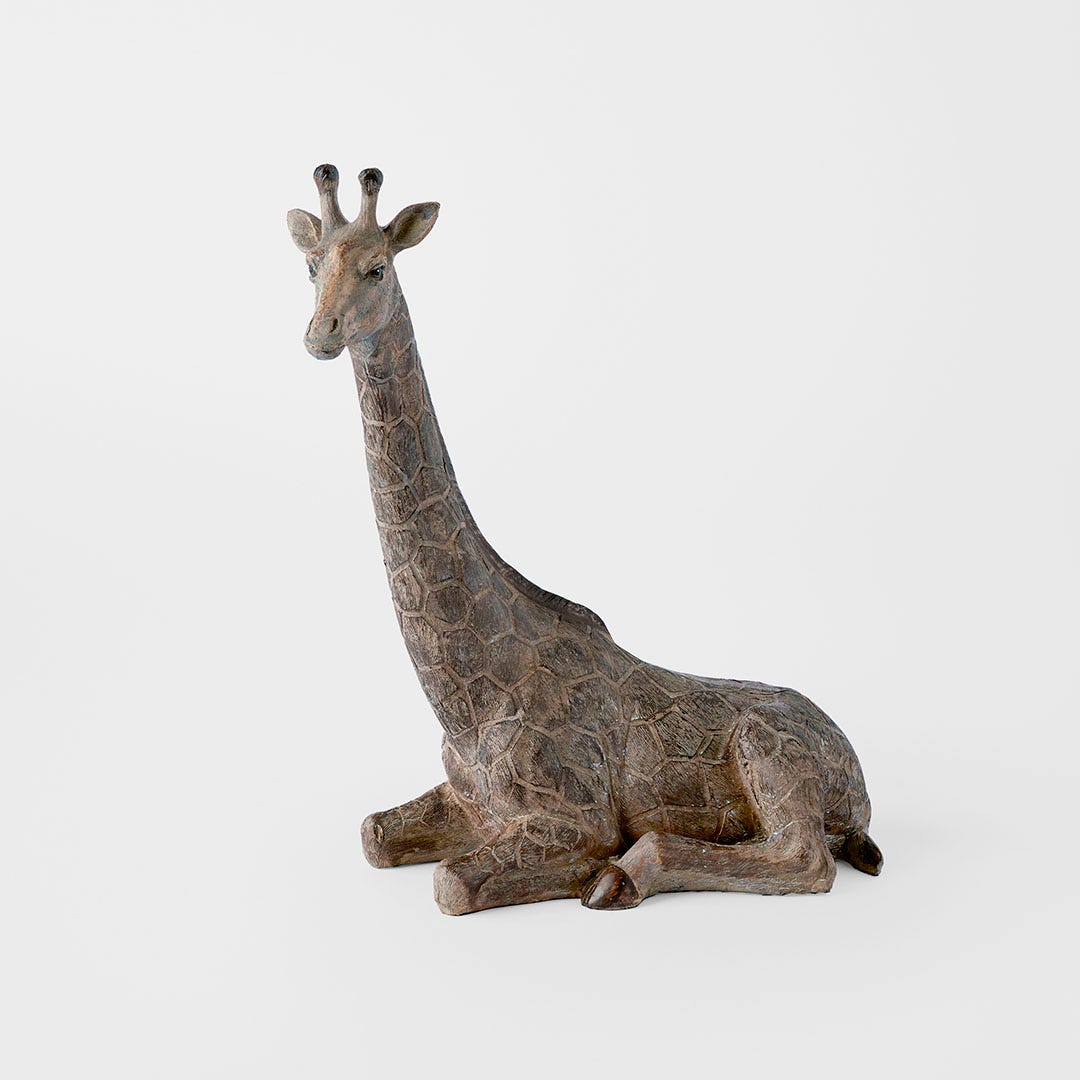 https://s3-ap-southeast-2.amazonaws.com/fusionfactory.commerceconnect.bbnt.production/pim_media/000/201/073/M_F_Sitting-Giraffe-Decoration_Brown_20483301_SI.jpg?1757888554