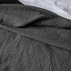 https://s3-ap-southeast-2.amazonaws.com/fusionfactory.commerceconnect.bbnt.production/pim_media/000/157/117/M_F_W24_Bedspread_Artemida_BOP-Charcoal_Detail-1_SI.jpg?1702356150