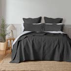 https://s3-ap-southeast-2.amazonaws.com/fusionfactory.commerceconnect.bbnt.production/pim_media/000/157/122/M_F_W24_Bedspread_Artemida_BOP-Charcoal_SI.jpg?1702356188