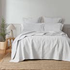 https://s3-ap-southeast-2.amazonaws.com/fusionfactory.commerceconnect.bbnt.production/pim_media/000/157/145/M_F_W24_Bedspread_Artemida_BOP-White_SI.jpg?1702356688