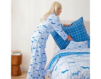 https://s3-ap-southeast-2.amazonaws.com/fusionfactory.commerceconnect.bbnt.production/pim_media/000/189/859/M_F_W25_Studio_LS_Flannelette_Shot_48_Charlie_Blue_PJs_092_SI.jpg?1740116742